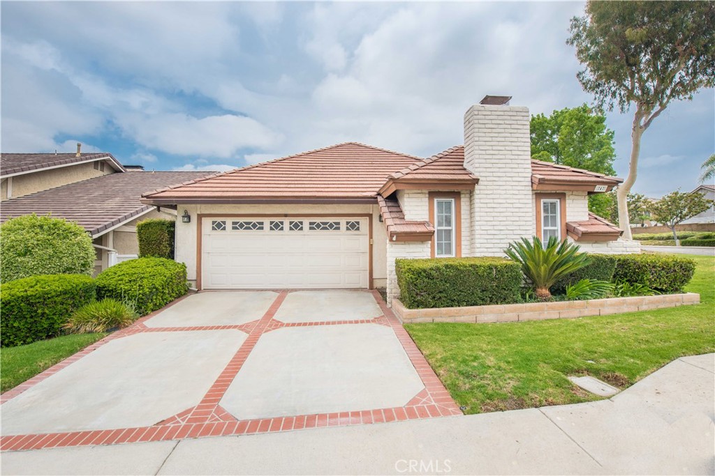 Welcome to 747 De Jesus Drive, a beautifully maintained single-story home located in the desirable Alta Placentia community. This charming 3-bedroom, 2-bathroom residence offers 1,724 square feet of comfortable living space on a generous 5,501 square foot corner lot. From the moment you arrive, you'll appreciate the home's inviting curb appeal and the sense of privacy offered by its prime location. Inside, the fully renovated kitchen stands out as the heart of the home, featuring modern cabinetry, sleek quartz countertops, stainless steel appliances, and a spacious layout perfect for both everyday living and entertaining. The adjacent family room flows seamlessly from the kitchen, creating an ideal open-concept living area. A separate dining room with a wet bar and large dual-pane windows allows natural light to pour in, while the cozy living room—with a bay window and gas/wood-burning fireplace—adds warmth and character. Throughout the home, tasteful updates elevate the space, including a recently upgraded guest bathroom and wood-look vinyl tile flooring that offers durability with a refined aesthetic. The huge master suite provides a peaceful retreat with its own private bath, and one of the secondary bedrooms enjoys private access to a charming atrium—perfect for relaxing or creating a small garden oasis. Additional highlights include ceiling fans, dual-pane windows, ample storage, and an attached two-car garage with built-in cabinets and overhead space. The low-maintenance yard features patio space ideal for outdoor dining and easy-to-care-for landscaping supported by community sprinkler systems. Located within walking distance of Samp Park and Alta Vista Country Club, and served by highly regarded schools such as John O. Tynes Elementary, Kraemer Middle, and Valencia High School, this home also offers the benefits of a low $230/month HOA fee, which includes front yard maintenance, access to a community pool, tennis courts, playground, and clubhouse. Best of all, there are no Mello-Roos taxes. This home combines solid construction with stylish upgrades and endless potential. Don’t miss the opportunity to own a move-in ready gem in one of Placentia’s most sought-after neighborhoods.