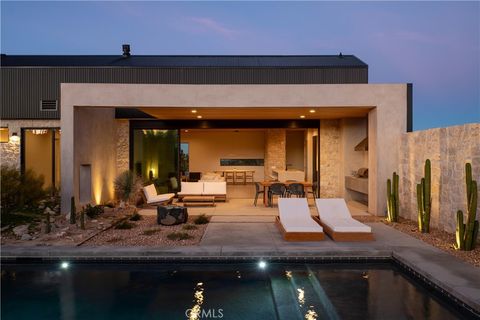 Photo of 5047 Brisbane Avenue, Yucca Valley, CA 92284 (MLS # JT25231744)