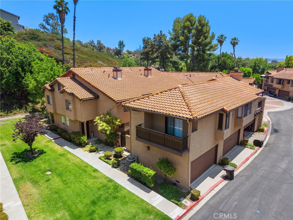 Welcome to this beautifully updated 3-bedroom, 2.5-bath end-unit condo, ideally situated in a lush, park-style community in the heart of West Covina. Enjoy a peaceful garden view and a private patio that’s perfect for morning coffee or cool evening lounging.
Inside, you'll find brand-new luxury vinyl flooring, fresh paint, and smooth ceilings throughout. The kitchen is upgraded with granite countertops, a new sink, new range/oven, microwave, and features a dishwasher and large pantry—designed for both daily living and entertaining.
The main floor offers a bright and spacious living room with a cozy fireplace, an open kitchen, and a convenient half bath. Upstairs, you’ll find three generously sized bedrooms, including a primary suite with dual closets and a private en-suite ¾ bath. The other two bedrooms feature large closets and share a full hallway bath. Laundry hookups and additional storage cabinets are also located upstairs for added convenience.
Additional highlights include central air and heat, a 2-car garage with opener, and resort-style amenities: a sparkling HOA pool, jacuzzi, BBQ area, and a nearby park with playgrounds. The HOA fee covers water and trash—helping you save on monthly utilities.
This thoughtfully upgraded and well-located home offers the perfect blend of comfort, convenience, and value. Don’t miss your chance to make it yours!