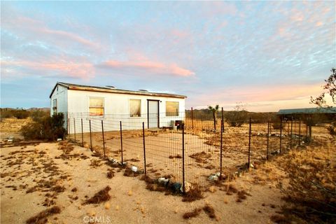 Photo of 177 Cherokee Trail, Yucca Valley, CA 92284 (MLS # JT25109103)