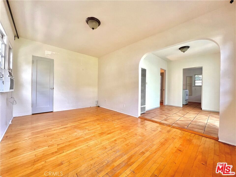 Welcome to this charming stand-alone unit nestled in the serene and picturesque neighborhood of Echo Park. This spacious 1 bed, 1 bath retreat offers a tranquil escape from the hustle and bustle of city life. Bathed in natural light, the unit exudes an inviting warmth, accentuated by original maple hardwood floors and tiled accents that add to its unique charm. The unit has a lot of various storage spaces, making it convenient to keep everything in order. Step outside and discover the allure of the gorgeous, expansive yard, perfect for hosting delightful gatherings with friends or simply unwinding in a peaceful oasis after a long day at work. This outdoor space provides ample room for relaxation and entertainment, making it a coveted feature of this lovely unit. With its peaceful surroundings, abundant natural light, and enchanting outdoor space, this stand-alone unit in Echo Park offers a rare blend of comfort and tranquility, creating an ideal haven to call home. This delightful stand-alone unit is ideally situated in the heart of Echo Park, surrounded by an array of charming cafes and vibrant pubs, creating the perfect balance of peacefulness and urban convenience. Within minutes, you can immerse yourself in the dynamic energy of city life, exploring the eclectic mix of local eateries, trendy boutiques, and cultural hotspots that define the neighborhood.