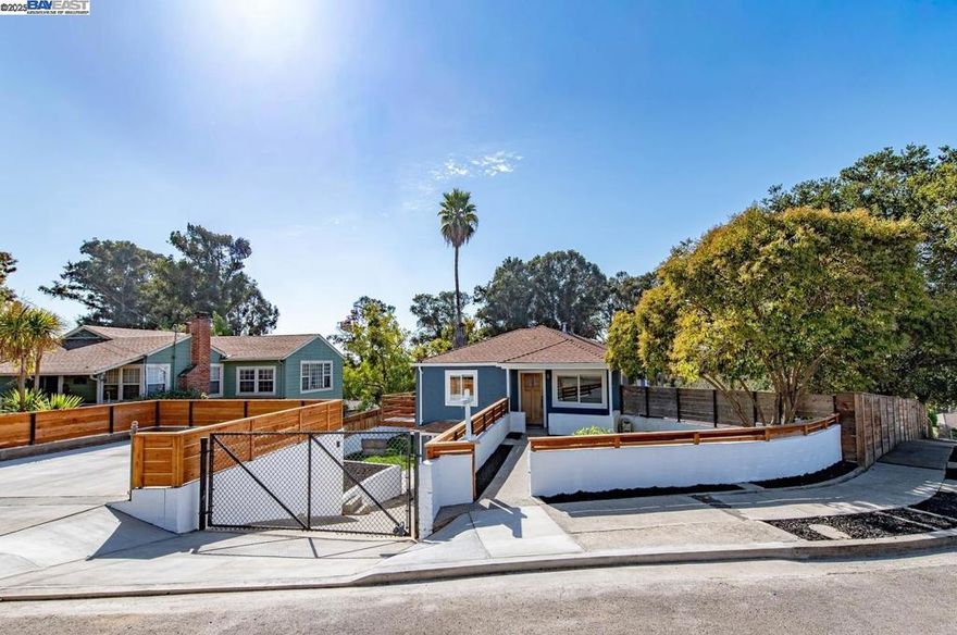 Rare opportunity to own this turnkey home, perfect for built-in rental income and/or for multi-generational living! Like new, as entire property has been fully remodeled throughout down to the studs with all new electrical, plumbing, and HVAC! Spacious single-level main unit with 3 bed/1 bath, open concept, tastefully upgraded with large kitchen island pre-wired for microwave, modern amenities, smart lighting, smart thermostats, entry lock and camera enabled doorbell. Solid wood doors throughout main living unit. Prewired CAT6 cabling throughout the primary. Main unit has front yard, kitchen door that leads to deck and large side yard.  Private downstairs 2 bed/1 bath ADU is a single level unit with separate front entrance away from the main home. Open kitchen and family room concept, large private enclosed front yard, and its own electrical sub-panel. Main home and ADU both have new appliances throughout, with separate heating and A/C units, new decor and flooring in classic neutral shades, and dual pane windows. 1863sf property has a total of 5 bedrooms and 3 baths, which includes 1 new bathroom with shower in the 1-car plus-size garage with 220V outlet. In addition to attached garage is a separate, newly paved large off-street parking pad that fits 2 cars!