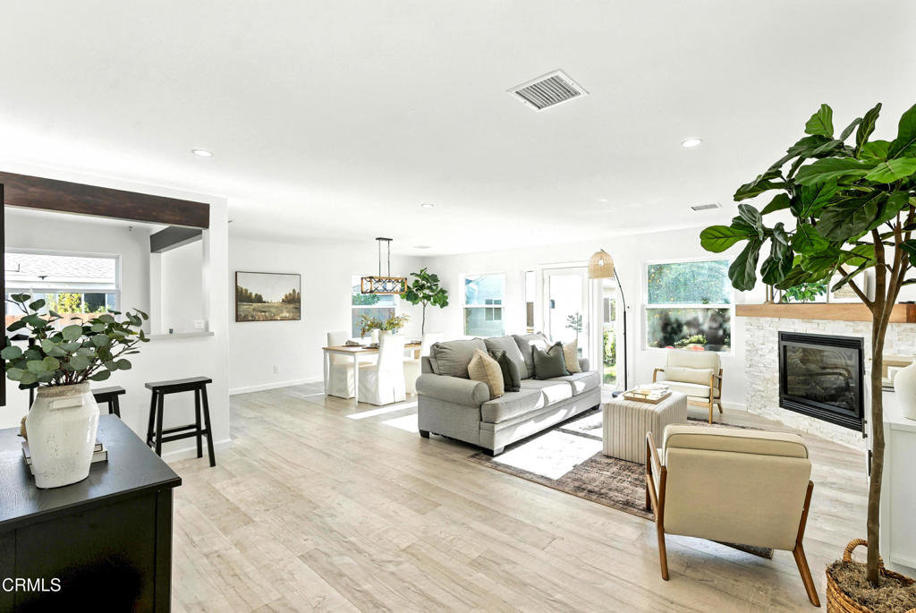 This tastefully remodeled single-story home with a detached guest house (ADU) is the perfect move-in-ready property in a desirable cul-de-sac location. The main residence features 3 bedrooms and 2 bathrooms across a bright, open-concept floor plan with clean finishes, updated flooring, and a seamless flow from the living room to the kitchen and dining area. The expansive backyard offers privacy and a serene setting for the whole family. Additional highlights include full home water filtration and convenient RV access.The detached guest house provides excellent flexibility--ideal for rental income, extended or multi-generational living, or a luxury home office. The layout allows for easy separation between the main home and guest house, ensuring privacy for both.Perfectly situated near shops, dining, and commuter routes, this property offers a low-maintenance lifestyle with valuable bonus space and exceptional long-term potential.