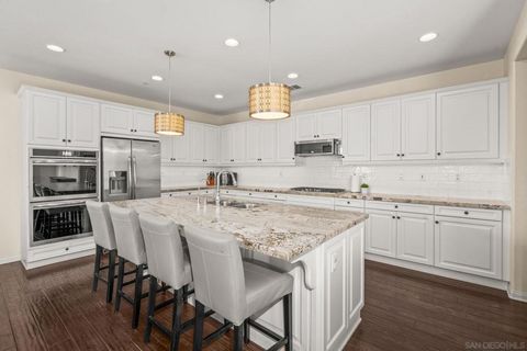 Photo of 15653 Tanner Ridge Rd, San Diego, CA 92127 (MLS # 250042618SD)