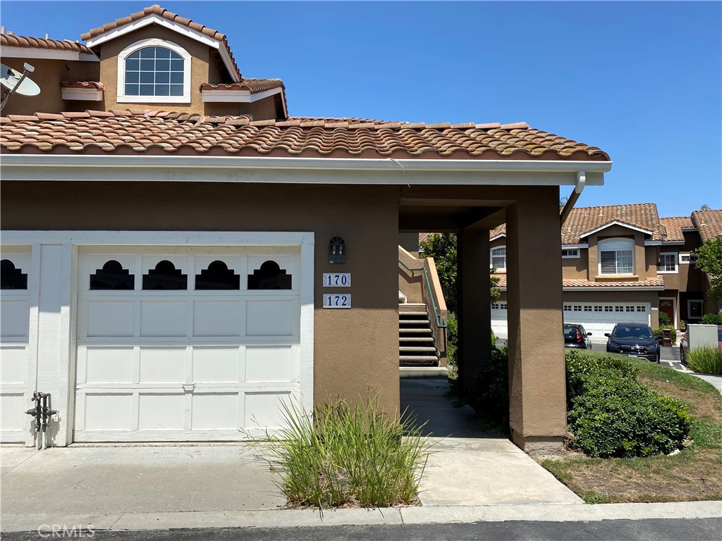 Welcome to this charming upgraded two-bedroom, two-bathroom ground floor condo in the desirable community of Provence D’ Aliso. As an end unit, this condo offers additional privacy and natural light. The recently renovated kitchen features shaker style cabinets and quartz countertops, complemented by a new stainless steel microwave and dishwasher, as well as a gas range. The spacious floor plan, filled with natural light, includes a cozy fireplace and opens to a private covered patio for your enjoyment. Inside, you'll find a convenient laundry area with a washer and dryer included. The primary suite offers direct access to the outdoor patio, a custom built-in closet with mirrored doors, and a generously sized bathroom with a vanity. The second primary suite includes built-in bench seating with storage, large closets, and direct access to the bathroom. Additional highlights include laminate flooring throughout, recessed lighting, and a freshly painted interior. This lovely unit also includes a one car attached garage with easy access into the home, and one designated parking space, along with plenty of guest parking. You will love the close proximity to the pool, walking trails, tennis courts, and all the amenities this peaceful community offers. This is a property you don't want to miss!