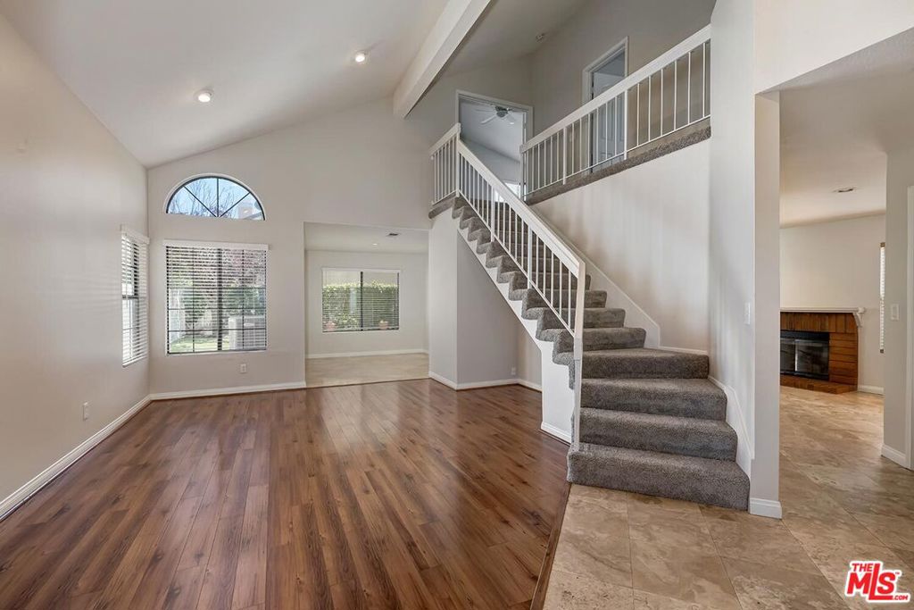 Charming 4BR/3BA home on a quiet, tree-lined street in the heart of Calabasas. Spacious living room w/ vaulted ceilings, formal dining, and cozy family room w/ fireplace great for entertaining. Updated kitchen features granite counters, stainless steel appliances, and breakfast bar, opening to a private grassy yard. Expansive primary suite w/ high ceilings, new carpet, ample closet space, and dual-sink bath. Three additional bedrooms w/ new carpet and generous closets. Inside laundry room, 2-zone A/C w/ smart thermostat, and 2-car garage w/ extra storage. Located in award-winning Las Virgenes School District, minutes from parks, shopping, and Malibu beaches. Shown by appointment only.