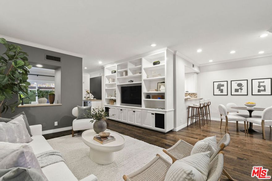 Just steps from Montana Avenue, one of Los Angeles' most coveted boutique and cafe districts, this beautifully renovated 3 bed, 3 bath townhouse captures the essence of coastal city living. Imagine starting out your morning strolling to your favorite coffee spot, afternoons shopping local boutiques, and evenings entertaining at home in style. Set within an intimate 5-residence community in the sought-after Franklin/Roosevelt school district, this home blends charm, convenience, and luxury. Inside, a warm, embracing feel with wide plank Hardwood Floors, an open kitchen, equipped with Sub-Zero, Wolf gas range with Miele appliances, Caesarstone countertops and multiple dining options, while the open living area flows between the open dining room with wet bar and Sub-Zero wine fridge, opening onto to your outdoor private patio with grill, perfect for al fresco gatherings. Upstairs, 3-sunlight bedrooms provide a serene retreat, highlighted by a vaulted ceiling primary suite with spa like bath, steam shower, towel warmer and dual vanities. Custom closets, upstairs laundry, and a private two car garage with direct entry add ease, functionality and security to everyday life. With a rare blend of walkability, boutique, luxury and a secure lock-and-go lifestyle, the Santa Monica townhouse offers the best of both worlds: vibrant city living in the comfort of home.