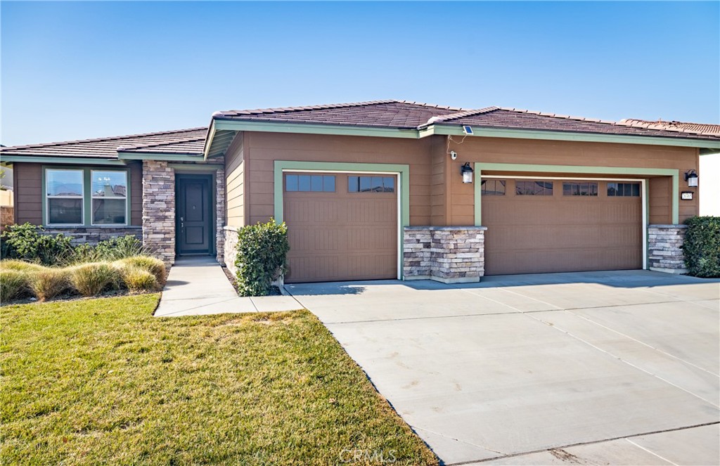 Stunning Single-Level Lennar Home in Citrus Trails – Prime Loma Linda Location. Welcome to the desirable Citrus Trails community! This beautifully maintained Hamlin Residence 2C, built in 2020, offers 3+ bedrooms, 2 baths, and 2,094 sq. ft. of thoughtfully designed living space, just minutes from Loma Linda University Medical Center and the Jerry L. Pettis VA Hospital. From the moment you step inside, you’ll be greeted by engineered wood flooring and a versatile front flex room—perfect for a home office, library, or sitting area. The open-concept great room showcases a cozy fireplace and seamlessly connects to the dining area and chef’s kitchen. The kitchen is a showstopper, featuring: Large center island with granite counters & breakfast bar; Stainless steel appliances, including double oven & refrigerator; Spacious walk-in pantry; Open sightlines to the living and dining areas for effortless entertaining; The primary suite offers a private retreat (optional sitting area, nursery, office or 4th bedroom), a large walk-in closet, and a spa-inspired bath with oval soaking tub, separate shower, dual vanities, and a private commode. Additional features include: Whole House Fan, Indoor laundry room with washer & dryer included; 3-car finished garage with epoxy flooring; Tankless water heater; Shutters & blinds throughout;9 solar panels for energy efficiency. Enjoy the outdoors with vinyl fencing, low-maintenance xeriscape landscaping, and a spacious patio—perfect for relaxing or entertaining. Located around the corner from Citrus Trails Park, offering pickleball courts, basketball hoops, BBQ/picnic areas, a dog park, playground, and walking trails. VA Loma Linda Ambulatory Care Center is just 0.7 miles away. No HOA. No steps. Move-in ready.
