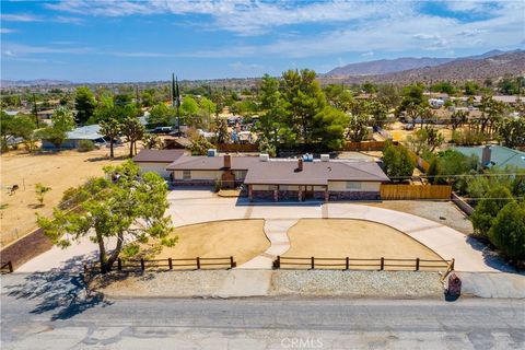 Photo of 7737 Aster Avenue, Yucca Valley, CA 92284 (MLS # JT26053412)