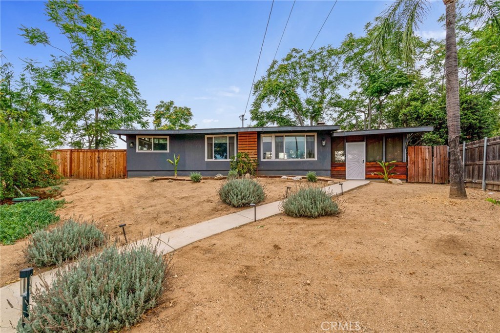 Wow! Home in South Redlands for under $550,000! This charming property features 2 bedrooms, 1 bath, a beautifully renovated bathroom, vaulted ceilings with exposed beams, a large enclosed patio, and a spacious lot with room to build.
Discover your own private retreat with breathtaking views of Yucaipa, the surrounding mountains, and Live Oak Canyon. This unique property offers direct access to scenic walking, mountain biking, and horseback riding trails, creating the perfect blend of adventure and tranquility right in your backyard.
The neighborhood is warm and welcoming, with friendly neighbors, a strong sense of community, and a family-oriented atmosphere where children play and residents greet each other on daily walks. Despite the secluded, mountain-retreat feel, the home is ideally located just minutes from shopping, dining, and only 10 minutes to vibrant downtown Redlands.
With only one neighbor, the backyard backing to the canyon, and the other side bordered by a water tower road, the setting provides both privacy and wide-open views. Outdoor living is made easy with a convenient backyard shower—perfect for rinsing off kids, pets, or after a trail adventure.
Just steps from Oakmont Park and Redlands Conservancy trails, this property is a rare opportunity to enjoy a serene lifestyle with every convenience nearby.