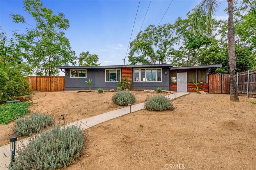 Wow! Home in South Redlands for under $550,000! This charming property features 2 bedrooms, 1 bath, a beautifully renovated bathroom, vaulted ceilings with exposed beams, a large enclosed patio, and a spacious lot with room to build.



Discover your own private retreat with breathtaking views of Yucaipa, the surrounding mountains, and Live Oak Canyon. This unique property offers direct access to scenic walking, mountain biking, and horseback riding trails, creating the perfect blend of adventure and tranquility right in your backyard.



The neighborhood is warm and welcoming, with friendly neighbors, a strong sense of community, and a family-oriented atmosphere where children play and residents greet each other on daily walks. Despite the secluded, mountain-retreat feel, the home is ideally located just minutes from shopping, dining, and only 10 minutes to vibrant downtown Redlands.



With only one neighbor, the backyard backing to the canyon, and the other side bordered by a water tower road, the setting provides both privacy and wide-open views. Outdoor living is made easy with a convenient backyard shower—perfect for rinsing off kids, pets, or after a trail adventure.



Just steps from Oakmont Park and Redlands Conservancy trails, this property is a rare opportunity to enjoy a serene lifestyle with every convenience nearby.