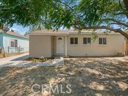 Welcome to this fully renovated two bedroom one bath home located on a large 8,386 square foot lot. The property's interior and exterior have recently been painted. Enter in to a good size living room, then into the kitchen which features a stove and newer microwave. Both bedrooms are good size and have a walk in closet. The bathroom has a newer vanity and sink, also a shower over tub. The laundry room is adjacent to the kitchen and has washer & dryer hookups. The one car garage has been converted to living area. The property has laminate flooring throughout, double pane windows, and central air & heat. The large lot is perfect for RV parking or you can build an AUD or Guest House. FHA and VA Buyers are welcome. This property would also be perfect for an investor looking for rental income. Close to the 14 Freeway, walking distance to the Clock Tower Metrolink Station and very close to the Antelope Valley Mall and the restaurants that the mall has to offer.
