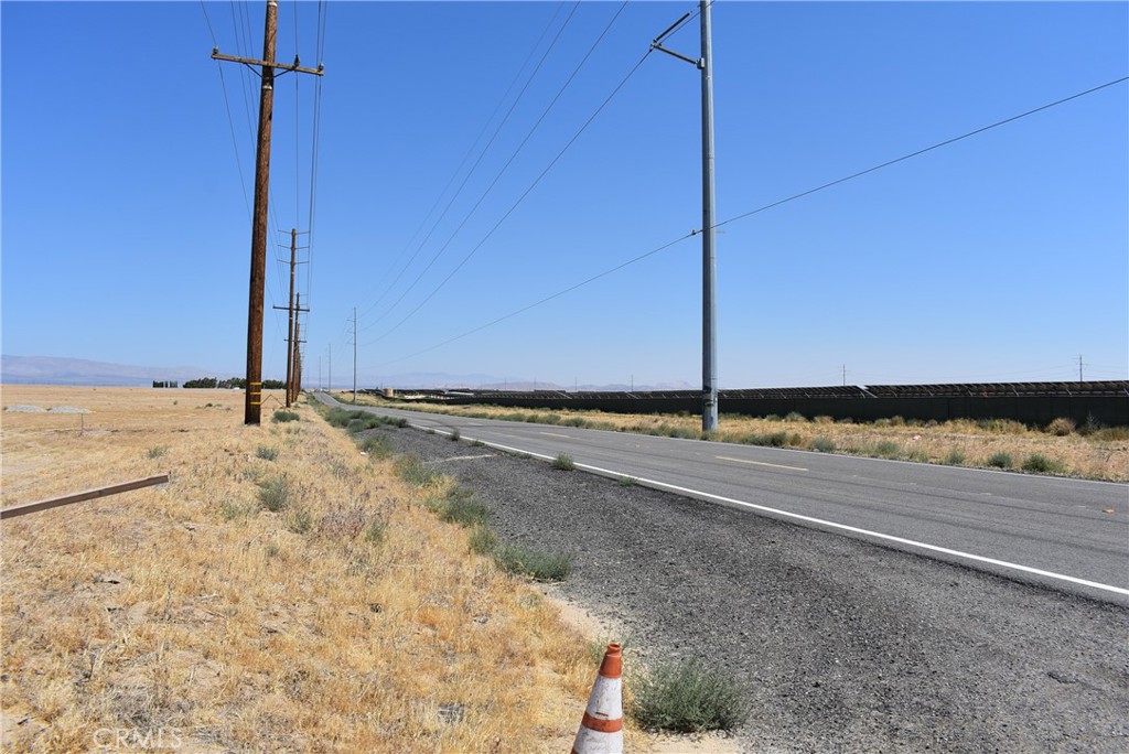 9.75 acres at the corner of 110th St West and Ave G8. The lot is zoned A22 for agriculture, animals, and a home. 327 feet of paved frontage on 110th St with power in the street, and1295 feet of dirt road frontage on Ave G8. APN 3265-014-014.