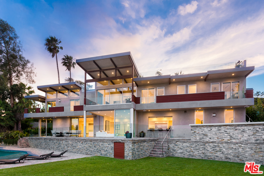 TROPHY PROPERTY WITH 5.0 CAP in a AAA neighborhood! Rare opportunity with this incredible income-producing property on a long term lease and generating stable above market rent. PROPERTY IS ON A MULTI YEAR LEASE WITH RENTS INCREASING 3% YEARLY. This meticulously crafted & newer built Architectural home is designed by renowned architect Anthony Zubick, AIA. The gated & private 7 Bed, 9 Bath entertainer's home offers UNOBSTRUCTED OCEAN VIEWS FROM THE QUEENS NECKLACE TO DOWNTOWN. A thoughtfully designed floor plan offers panoramic views from nearly every room. Chef's kitchen featuring Wolf and Miele appliances seamlessly flows to dining & family rooms. Floating staircase leads to 4 bedrooms & a luxurious master wing w/dual closets, wrap around deck & world class master bath. Pocketing Fleetwood doors open to an expansive flat yard w/a full kitchen, pool & spa, fire pit, mature trees, & more. SMART HOME by Crestron. Perfect for a 1031 exchange!
