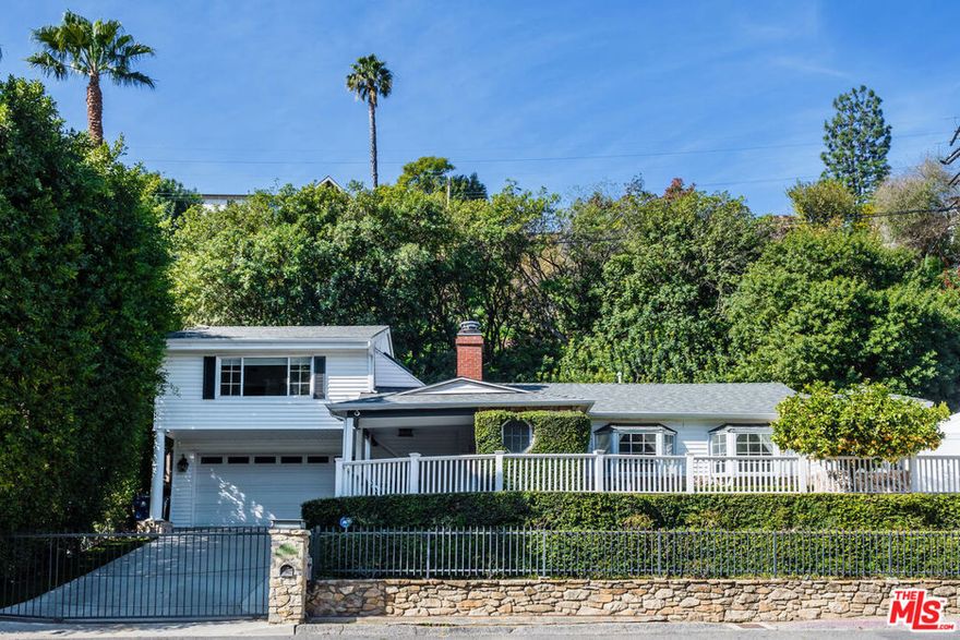 This is a beautifully furnished and gated pool home that also serves as a tranquil retreat, nestled in the hills in Sherman Oaks bordering Beverly Hills. Featuring 3 spacious bedrooms, 2 sparkling bathrooms, the property features nature views from every window. The home boasts neutral color tones, hardwood floors, an open kitchen with subway tile, quartz counter-tops, Viking Appliances, marble bathrooms, and heated pool! The master bedroom is secluded upstairs with vaulted ceilings and black out window coverings and a luxurious bathroom and walk in closet. This home has it all. Located behind gates on a quiet street.