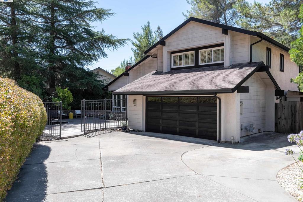 Welcome to highly sought-after Alhambra Hills Court! This light-filled and inviting 4-bedroom, 3-bath home with an office (possible 5th bedroom) offers 1,929 sq ft of thoughtfully designed living space on an 8,740 sq ft lot. Nestled at the center of the court, this 1977-built gem blends classic charm with modern updates in a private, parklike setting perfect for entertaining. Inside, soaring ceilings, fresh paint, and refinished hardwood floors highlight the bright, open layout. The living room features a grand staircase, large windows, and gas fireplace, while the cozy family room includes built-in bookcases. The updated kitchen offers a 6-burner gas stove, breakfast bar, and backyard views, with a separate formal dining room ideal for gatherings. A bedroom and full bath on the main level suit guests or multigenerational needs. Upstairs includes 3 bedrooms, including a spacious primary suite with private bath. Enjoy lush outdoor space, ample parking, and a 10x12 shed with 220-amp power—great for a studio or workshop. Close to parks, downtown Martinez, shops, top schools, and commuter routes—this is the one!