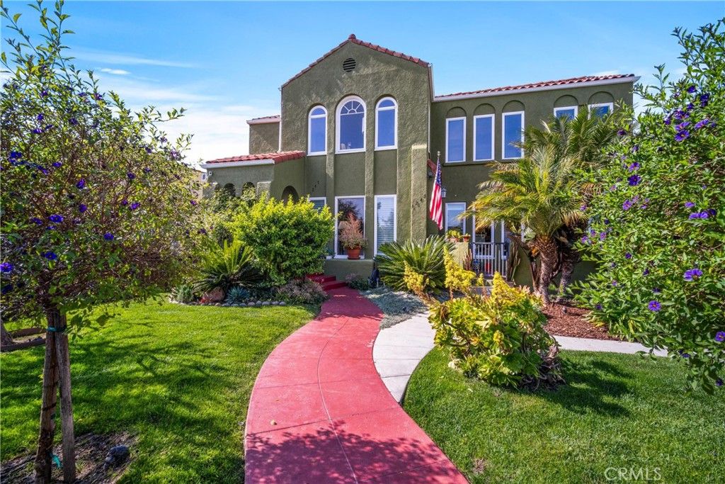 Photo of 1245 S Hudson Ave, Los Angeles, CA 90019 (MLS # SR25239510)