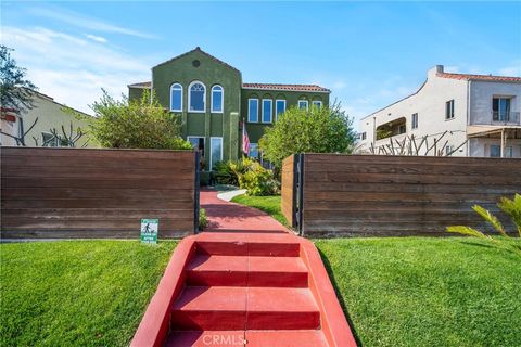 Photo of 1245 S Hudson Ave, Los Angeles, CA 90019 (MLS # SR25239510)