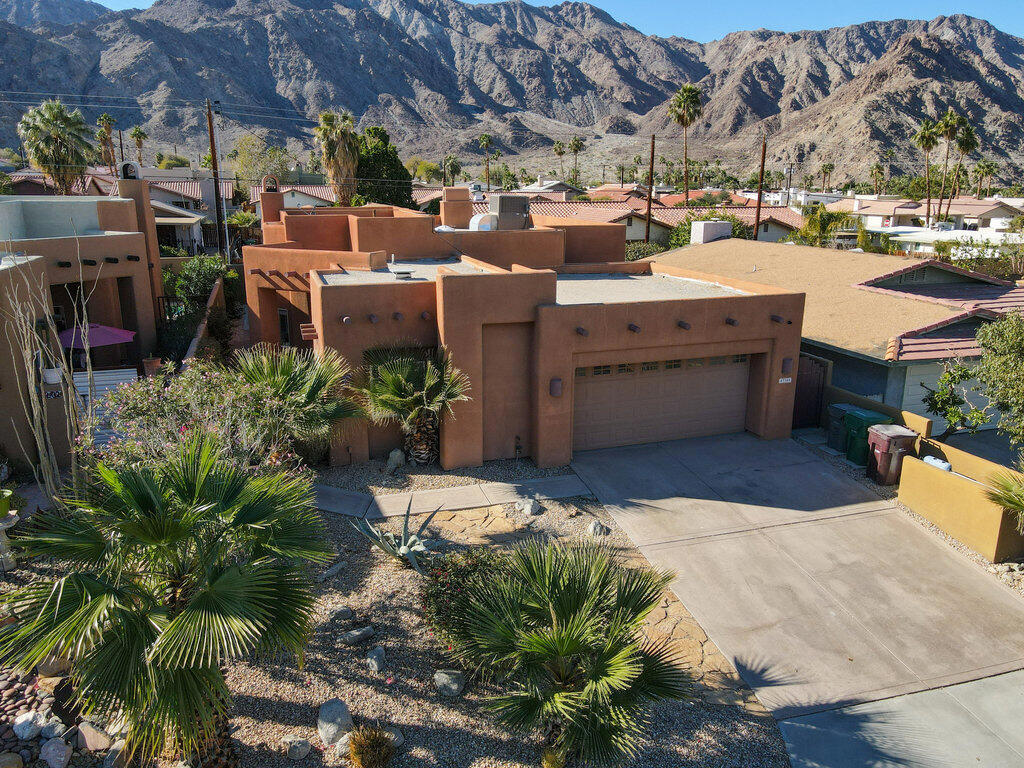 Welcome to your Desert Oasis perfectly centered in the La Quinta Cove. This 3 bed 2 bath Spanish style single story Pool home is the perfect place for fun and relaxation. Upon entering the home you are greeted with high rise ceilings giving the home a bright and open feel. The kitchen is spacious with plenty of cabinet space and stainless steal appliances. The Master bedroom is large and boasts an adobe style fireplace for peaceful warm evenings. The master bath comes equipped with dual sinks, walk in shower, tub and plenty of storage. The primary guest bedroom has direct access to a quiet side yard for easy outside access. You also have an attached 2 car garage with large driveway for plenty of parking space. The home features an interior laundry area for climate control convenience. Your backyard is a private oasis complete with a deco pool. Minutes from Old Town La Quinta with shopping, restaurants, golf, pickle ball and plenty of walking trails.