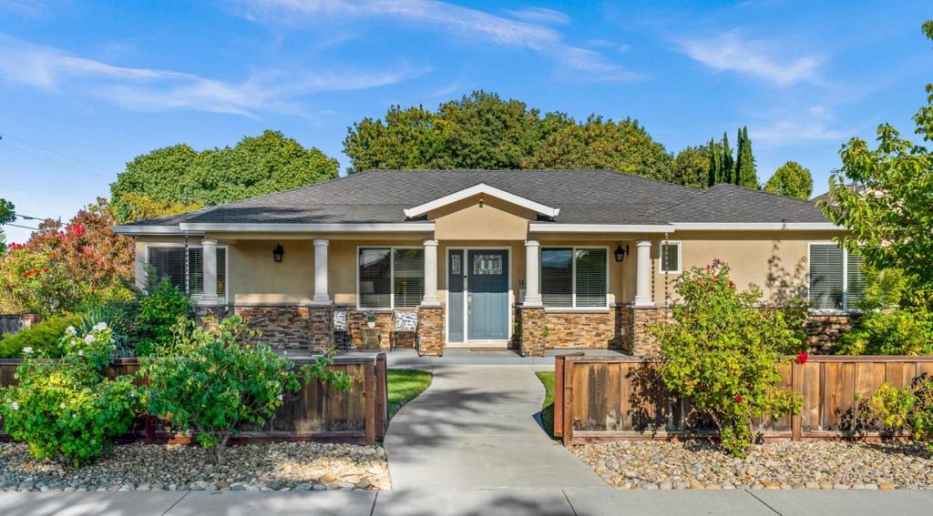 Welcome to this beautifully renovated single-story home in the heart of Santa Clara! This house blends modern design with comfort, on a quiet expansive corner lot right next to a neighborhood park. 10K+ sqft lot offers great potential! Right next to major lifestyle hubs like Santana Row & Valley Fair Mall. Close to many Silicon Valley Tech Giants, such as Nvidia, Apple, ServiceNow, Applied Materials, AMD, Agilent, etc. & prestigious Harker High School. Completely renovated in 2018, from roof, double-pane windows/french doors, furnace, A/C, copper plumbing, tankless water heater, 200 AMP electrical panel, to all premium interior finishes, including engineered HW floors, recessed lights, and interior doors. It features an elegant open kitchen with a massive island, granite counter tops, white cabinetry, two big skylights, all stainless steel appliances (including the 36" gas stove, beverage refrigerator, built-in microwave, double-drawer dishwasher), and under-cabinet lighting. The living room is accentuated by a cozy gas fireplace. The spacious primary suite offers an ensuite bathroom & a walk-in-closet w/ built-in organizers. Indoor laundry room. Attached finished 2-car garage. Beautifully landscaped in the front & the back. Easy access to HW280, 880, 17, & San Tomas Expressway.