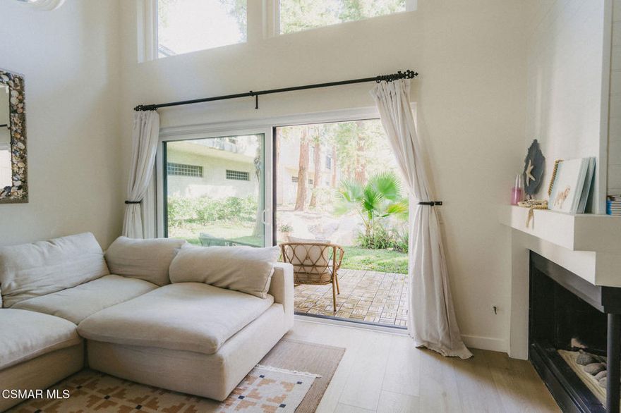 Beautiful and spacious, this designer remodeled home has been completely transformed within the last two years. This 1 bedroom, 2-bathroom home blends resort-like surroundings with meticulous craftsmanship. The open-concept kitchen remodel features custom cabinetry, premium Samsung appliances, quartz waterfall countertops, and a thoughtfully added pantry with custom shelving. Living room is spacious and bright with a fireplace for cozy evenings. The interiors impress with smooth-floated ceilings, premium flooring with cork underlayment on both levels, and a striking custom floating staircase finished in deep navy with crisp white beams. Every detail was considered -- from brand-new double-pane windows and updated, code-compliant electrical outlets to a new HVAC system, water heater, and modern lighting throughout.The expansive primary suite includes a full bath with custom walk-in shower. Both bathrooms were fully renovated with designer finishes, custom vanities, and premium fixtures.Additional upgrades include a custom wood-paneled fireplace, automatic shades on the second floor, and new patio decking that seamlessly extends the living space outdoors to enjoy the serene views. A truly turnkey home that perfectly balances comfort, craftsmanship, and contemporary design.