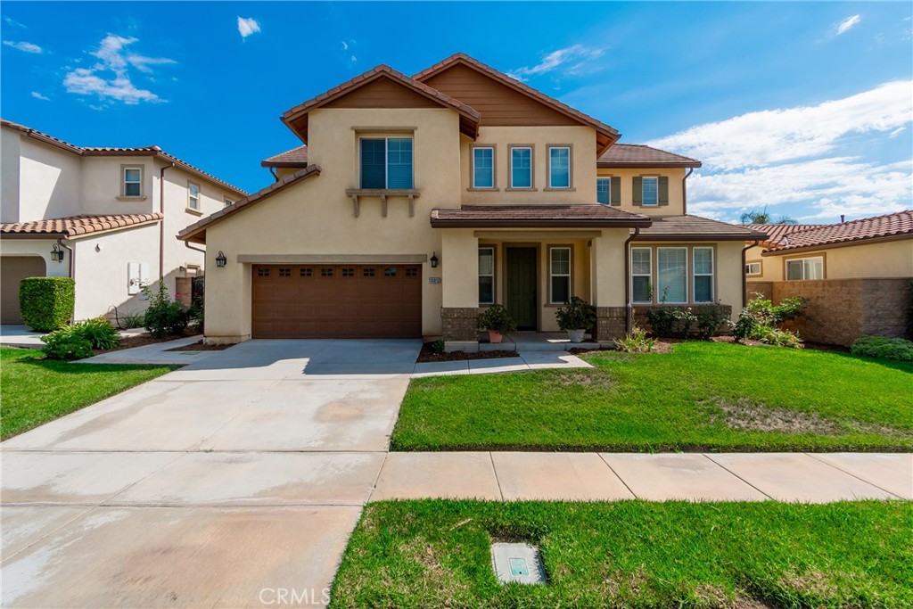 Welcome to this beautifully elevated, light and bright 5-bedroom, 3-bathroom home nestled in the prestigious gated community of Riverwalk Vista. Step inside to soaring ceilings and an open, flowing layout that’s perfect for entertaining—this home truly has it all. As you enter, you’ll find a formal living or dining room, a spacious living room with sliding glass doors to the patio, and a gourmet kitchen with a large pantry and generous island. The main floor also features a massive laundry room, a 3-car tandem garage, and a downstairs bedroom with a full bathroom—ideal for guests or multigenerational living. Out back, enjoy a low-maintenance yard with fruit trees, a large storage shed, and sweeping views. Upstairs, the expansive primary suite includes its own private balcony with breathtaking sunset views. Three additional bedrooms and another full bath surround a large, versatile loft space—perfect as a family room, home office, gym, or even an extra guest area. This gorgeous home is in a highly desirable part of Riverside, with nearby access to grocery stores, restaurants, Kaiser Permanente, and the Galleria Mall. The house is close to the La Sierra Metrolink Station, to freeway 91 and 15. 2 A/C units for the house and the community pool will make your summer not only comfortable but also enjoyable.