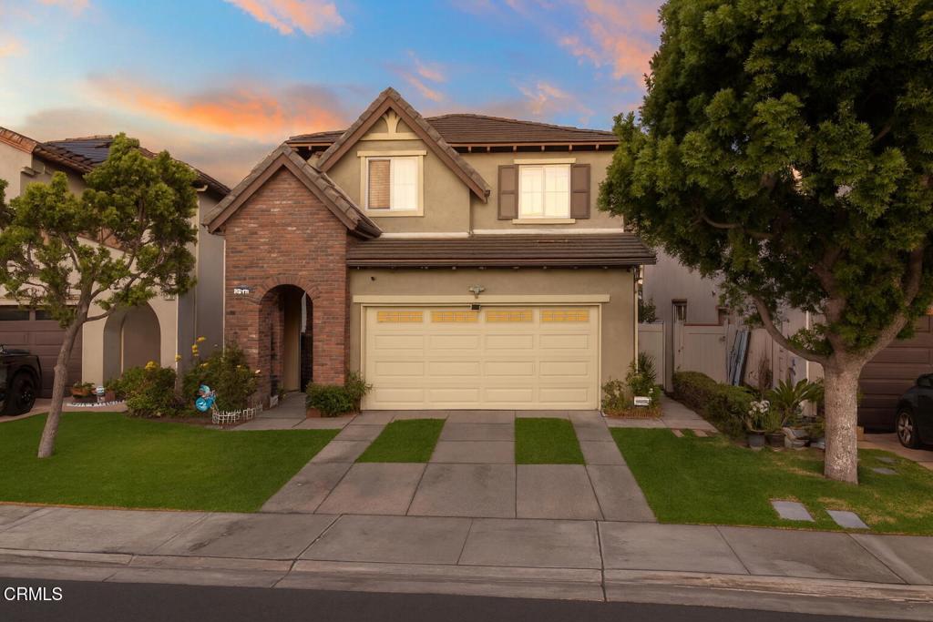 Welcome to this warm and welcoming gated home in Oxnard! Built in 2006, this 4-bedroom, 3-bath residence has been refreshed with new interior paint and updated cabinets with modern hardware, creating a clean and inviting feel throughout.Inside, enjoy an open floor plan with tile flooring, recessed lighting, a cozy fireplace in the living room and central A/C to keep you comfortable year-round. The kitchen boasts freshly painted cabinetry, ample counter space, and a bright view of the backyard. Upstairs, all four bedrooms are well-sized, with the convenient laundry room located on the same level.Outdoors, you'll find a low-maintenance backyard perfect for entertaining, basketball, or weekend barbecues. The attached 2-car garage provides plenty of storage.The grounds are beautifully maintained by the HOA in additional to security patrol for added peace of mind. Conveniently located close to the freeway, this home offers easy access to shopping, dining, and coastal destinations.