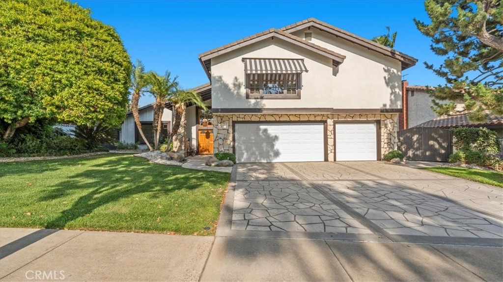 You will be delighted when you pull up in front of this amazing residence. Its freshly painted exterior embodies the essence of refined living in one of Upland's most sought-after neighborhoods. This meticulously updated home offers a harmonious blend of elegance & comfort, ideal for those who appreciate quality craftsmanship & thoughtful design. Upon entering through the stately double doors, you're greeted by an expansive, open floor plan bathed in natural light, thanks to soaring ceilings & an abundance of windows. The freshly painted interiors & new carpeting throughout create a welcoming atmosphere, setting the stage for both relaxed living & sophisticated entertaining. The heart of the home is the beautifully updated kitchen. It features newer appliances & gleaming quartz countertops. Adjacent to the kitchen is a cozy nook, breakfast bar & a spacious family room, all offering serene views of the thoughtfully manicured backyard. Step outside to discover a sparkling pool, a rejuvenating spa, & a generous patio area. The space is perfect for alfresco dining. This yard is the ideal place for making memories with family & friends. The main floor boasts a versatile bedroom or office space with an adjacent full bathroom. Upstairs, the primary suite serves as a private retreat, complete with an enormous walk-in closet, dual vanities with quartz countertops, & a walk-in shower. A separate sitting area within the primary suite provides an ideal space to relax & enjoy a good book or your favorite game on TV. Two additional generously sized bedrooms share an updated hall bathroom. It features a new vanity & quartz countertop. Additional highlights for this property include an attached three-car garage, a dual air conditioning system & a Generac home backup power system. There is also fully paid solar. This home has been lovingly updated throughout. In addition to the new paint, carpet, updated kitchen & baths, there are new fixtures, ceiling fans & more. This property is the definition of "move-in condition". It will not last. The gorgeous curb appeal, along with the expansive backyard that is enhanced by mature fruit trees, makes this space so appealing. This residence is situated north of the 210 Freeway and offers convenient access to top-rated schools, shopping, dining, & recreational amenities. It is also located in a tranquil and welcoming community. Upland is known as “The City of Gracious Living.” Some photos have been virtually staged.