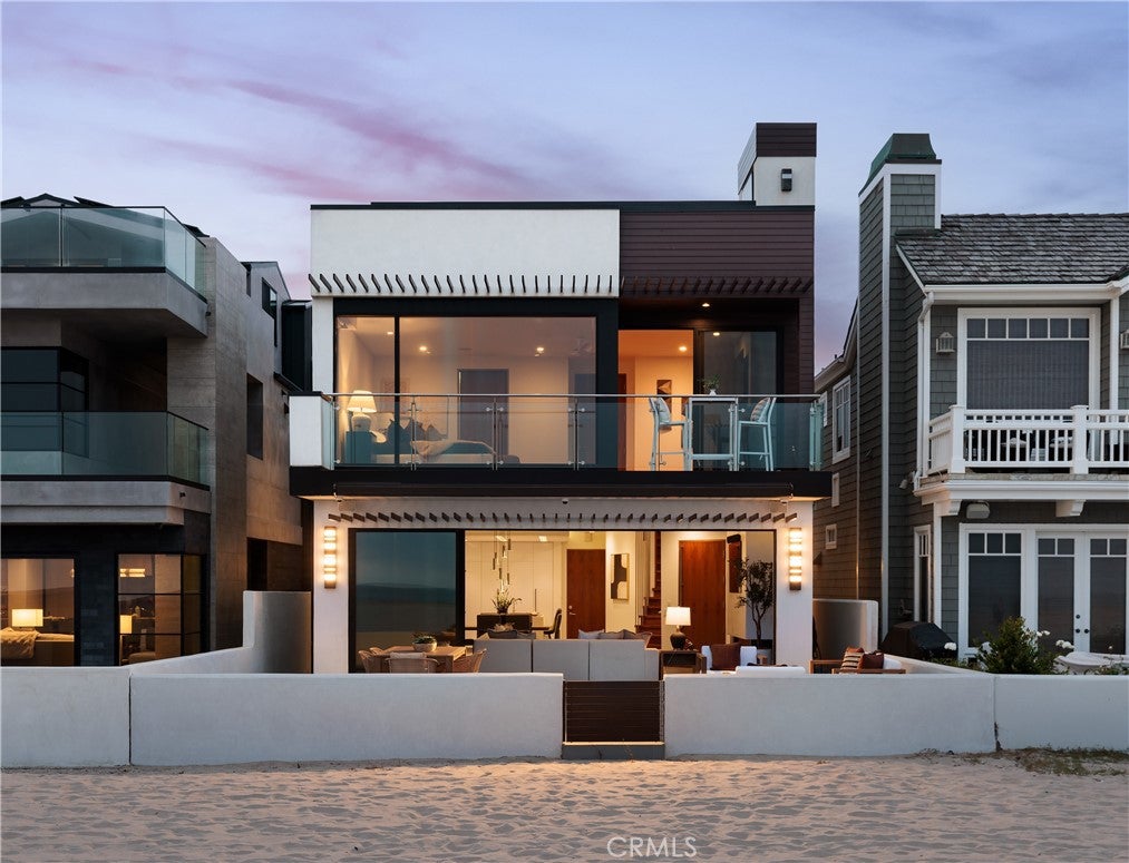 Photo of 7104 W Oceanfront, Newport Beach, CA 92663 (MLS # OC25133061)