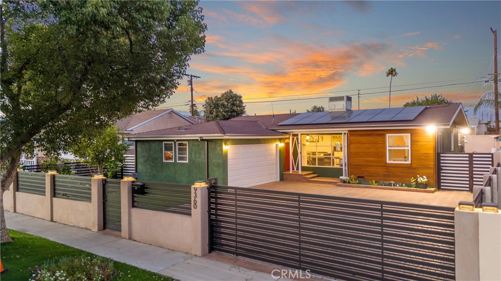 Welcome to 9360 Obeck Avenue, a beautifully upgraded home set on a picturesque tree-lined street in one of Arleta’s most desirable neighborhoods. Behind the fully gated front yard with an electric rolling gate, this residence offers the perfect balance of modern updates, privacy, and charm. Inside, you’ll find three bedrooms and two bathrooms, including a private primary suite with a spacious en-suite bath featuring an oversized shower. The additional bedrooms share a nicely updated hallway bathroom. The kitchen has been thoughtfully upgraded with newer cabinets, appliances, and countertops, creating a stylish and functional space at the heart of the home. This property is loaded with upgrades, including owned solar panels that provide substantial energy savings, a brand-new roof that’s just one year old, and brand-new pavers that surround the home in both the front and back. A tankless water heater and new exterior drainage system add to the efficiency. Step outside to enjoy the sparkling blue pool, perfect for sunny California days, and take in the curb appeal highlighted by the modern redwood siding in the front and a flourishing rose garden in the backyard. With its thoughtful design, exceptional privacy, this home is an ideal choice for families or individuals alike.