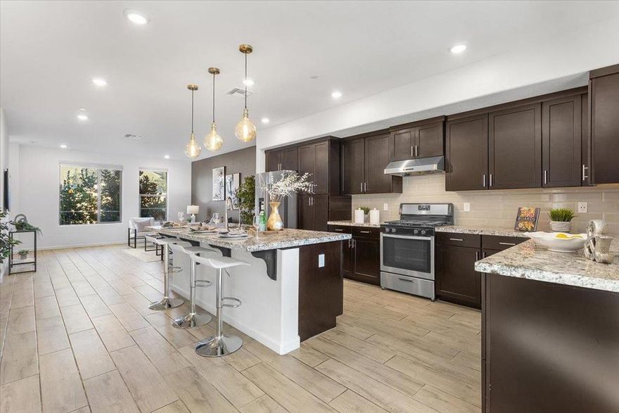 ** MODERN MARVEL with VIEWS ** Built in 2019, this stylish townhome is move-in ready * Abundant bright & airy living space w/soaring ceilings & gorgeous views of the foothills from the primary suite * 2nd En-Suite conveniently positioned on the ground level for multi generational living, guests, or a private office * 2 kW Solar system (owned) w/ EV outlet in garage * Expansive kitchen w/massive island, custom hood over range, granite countertops, S/S appliances & engineered tile flooring seamlessly flows into the dining & living areas for an open concept lifestyle * Relaxing primary suite w/ walk-in closet & luxurious, spacious bath featuring both tub & shower stall, dual sinks * Upstairs laundry where clothes live * Tankless water heater, dual pane windows, recessed lights * Multi-Zone central AC & heat * Rare side by side attached 2 car garage * Spacious balcony * Enjoy everything California weather has to offer in the communitys BBQ area & playground, great for entertaining * Show off your green thumb in the shared garden * Convenient location in dynamic, robust community, close to restaurants / shopping / Garin Regional Park / BART / San Mateo bridge / hwys 580 & 880 **WELCOME HOME**