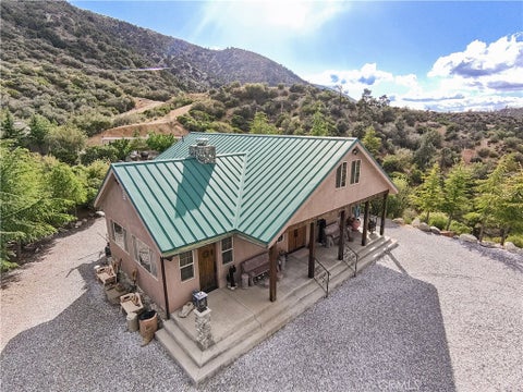 Photo of 1870 Oak Springs Valley Road, Wrightwood, CA 92397 (MLS # TR26087032)