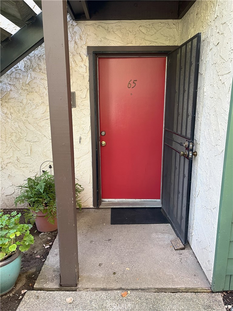 Two bedroom, one bath, downstairs condo at Wood Oak Condos. Next door to One Mile recreation area and pool. Freshly painted, new carpet and professionally cleaned porcelain tile. This home is ready to live in! Property is tucked back from streets and main parking lot.Wood Oak has a pool, hot tub, sauna and club house. This unit has an extra-large lot/patio area. It is an excellent location for access to shopping, restaurants, entertainment, etc.