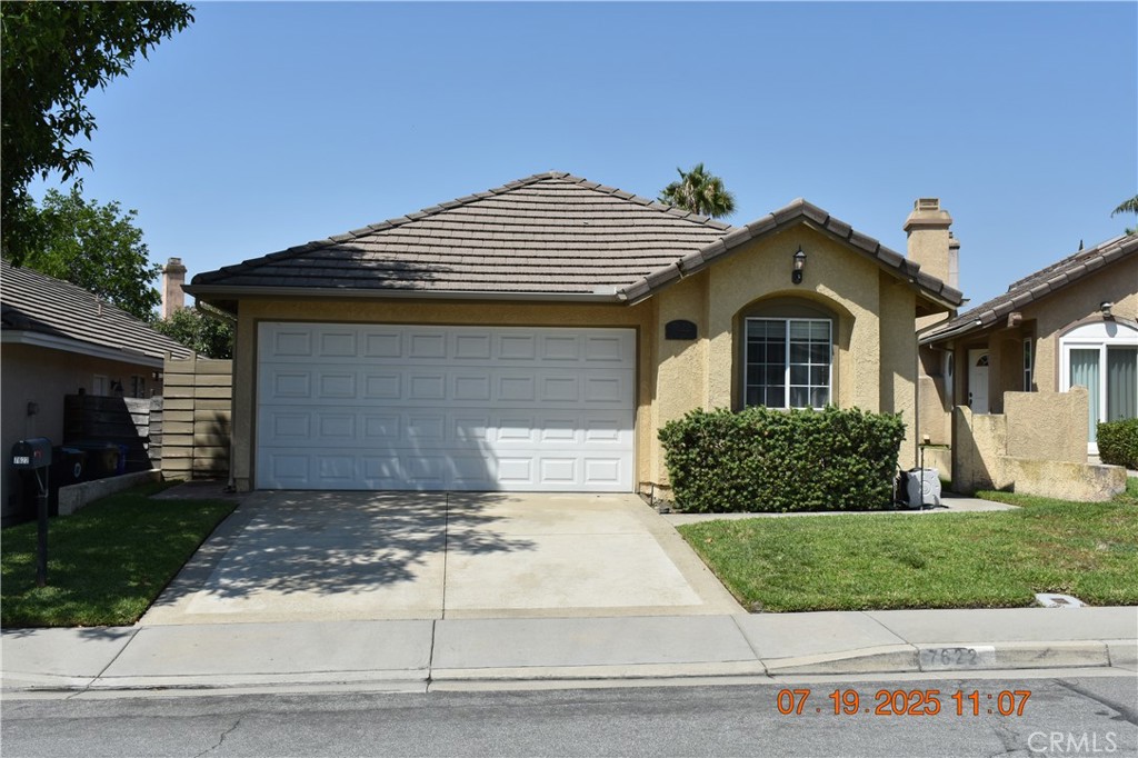 Beautiful single-story home is perfect for the family looking to move into a nice neighborhood! The bright & open floorplan features tall ceilings & sky light that brings in a ton of natural light with 3 spacious bedrooms & 2 full bathrooms. The primary bedroom has vaulted ceilings & sliding glass door out to the rear yard. The open living room features a beautiful rock faced fireplace & formal dining area. The kitchen features ample cabinet & counter space plus a cute breakfast nook, includes a Fridge & direct access to the attached 2 car garage with laundry area which includes washer and dryer. The rear yard features a Aluma wood covered patio and is perfect for entertaining friends & family for a bbq. The home also has an upgraded heating & A/C system, extra blown-in insulation, conveniently located near parks, Victoria Gardens Outdoor shopping, Ontario Mills and the local freeways