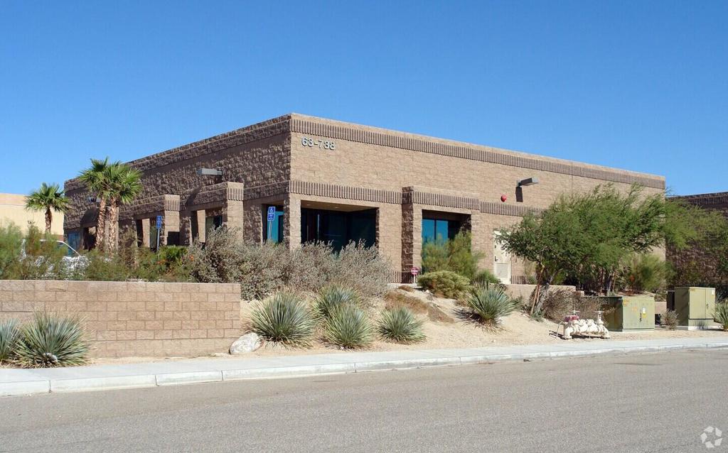 Located just off of Interstate 10 at the Indian Canyon Drive exit, this single-tenant Industrial M-2 zoned building is available for sale or lease with the option to buy. The building consists of approximately 1,000 square feet of office space with a reception area, two private offices, a kitchenette, and private restroom. The attached warehouse area is approximately 4,000 square feet featuring two 14 foot ground level doors, two main access doors, it's own dedicated HVAC system, and a private restroom. Access to and from to and from the rest of the Coachella Valley and beyond is reliable and consistent with no issues of flooding or blowing sand. Ten standard parking spaces are available for your parking needs. Seller will carry for all qualified buyers.