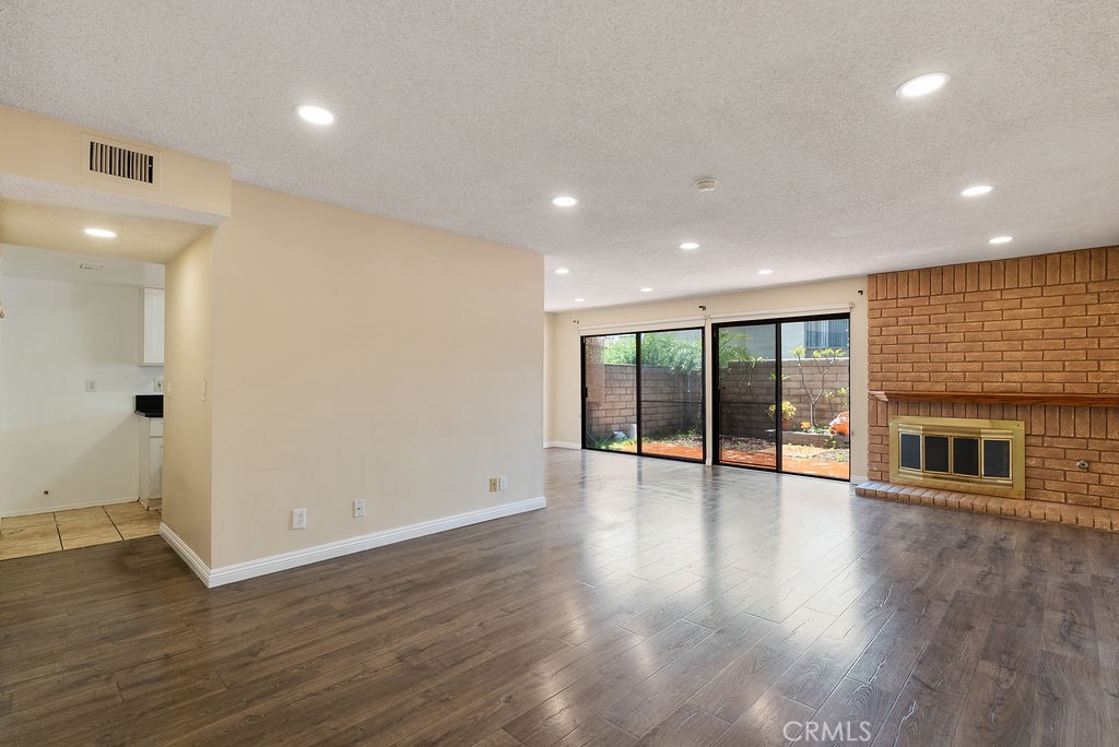 If you’ve been searching for the perfect home in a serene and desirable neighborhood, this stunning townhouse in North Glendora has everything you’ve been dreaming of. Nestled within a small, exclusive complex of just seventeen units, this spacious and stylish townhouse is designed for comfortable, modern living. Key Features: Spacious Layout: Functionally there is a 3rd room upstairs, though on tax records shows a 2 bedroom. The third room has been cleverly adapted to be a small bedroom or office perfect for remote work or guest space. Elegant Living Spaces: The expansive living room features a cozy gas fireplace, while the formal dining area provides an ideal setting for family meals and entertaining. Private Outdoor Oasis: A large yard area on the back offers a tranquil space to unwind or host gatherings. Convenience at Your Fingertips: With an indoor laundry area, direct-access two-car garage, and a move-in-ready design, this home is perfectly suited to your lifestyle. The outdoor balcony boasts mountain views: Wake up to picturesque mountain views that add a touch of nature to your everyday life.