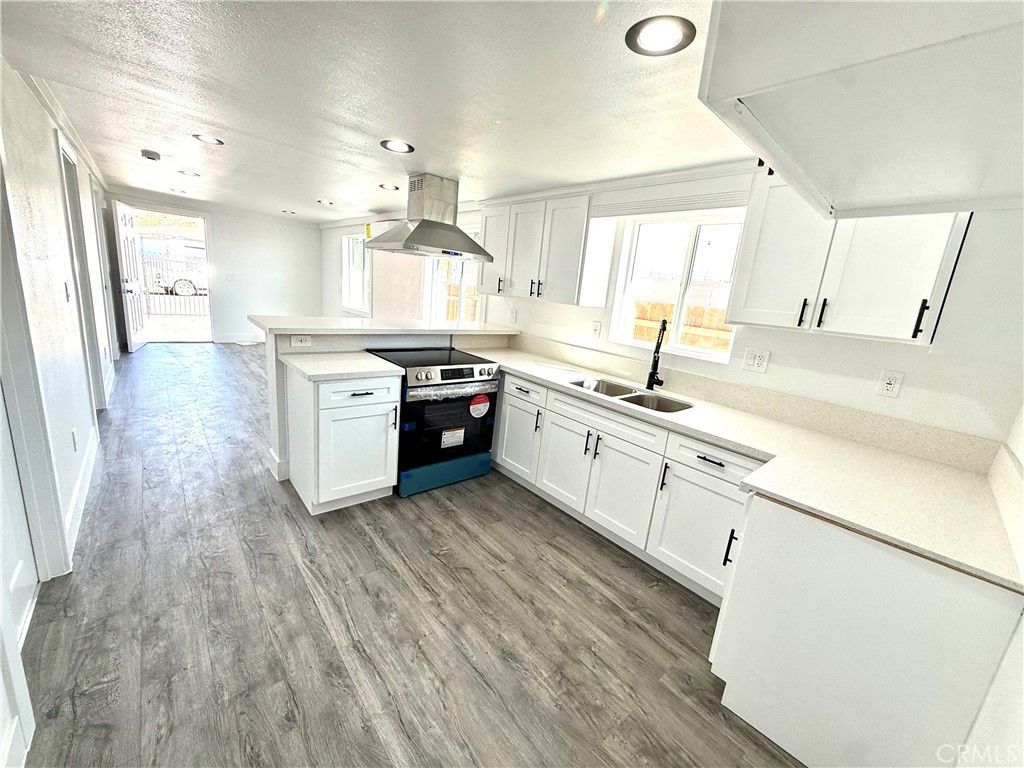 Photo of 2368 E 107 th st St, Los Angeles, CA 90002 (MLS # DW26087903)