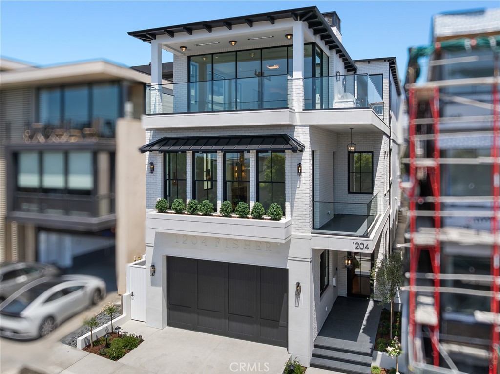Feast your eyes on this visionary luxury estate the highly sought-after Hill Section of Manhattan Beach, where unparalleled design meets panoramic ocean views. Spanning approximately 5,297 square feet, this meticulously crafted 6-bedroom, 8-bathroom residence redefines beach living.
The expansive top floor is an entertainer’s dream, offering uninterrupted, breathtaking ocean views framed by soaring ceilings and seamless sliding pocket doors that open to generous decks, creating an ideal indoor-outdoor flow. The open-concept living spaces center around a state-of-the-art kitchen featuring top-tier appliances and sophisticated styling, perfect for both intimate gatherings and large-scale celebrations. The primary suite serves as a private sanctuary, offering its own ocean vistas, a spa-inspired bath with awe-inspiring finishes, and an expansive walk-in closet. Each of the home’s bedrooms is thoughtfully designed as a private retreat. Additional features include a private home theater, three-stop elevator, and a three-car garage, all ensuring the highest level of comfort and convenience.
Located just moments from the vibrant heart of downtown Manhattan Beach, this home offers unparalleled access to world-class dining, shopping, award-winning schools, and the iconic beach lifestyle. This is more than just a residence; it’s a rare gem in one of Southern California’s most desirable coastal communities.