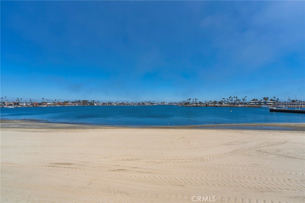 An exceptional opportunity to own a one-of-a-kind beachfront property on the coveted Bay side of Long Beach Peninsula. This sun-drenched retreat offers unobstructed panoramic views of the bay, nearby islands, and marina—without a bike path between you and the sand. Just a short stroll to the Yacht Club, this home blends privacy, luxury, and coastal charm in an unbeatable location.
Originally designed as a triplex, the upper two units have been seamlessly combined to create a spacious 5-bedroom, 2-bath layout, connected by an interior doorway. Upper unit includes a 3-bed, 1 full-bath Beachfront space, while the other upper back unit offers 2 beds, 1 bath space and an elevator for convenient access. These units have a/c.
The lower-level unit has been fully renovated and boasts 2 bedrooms, 3/4 bathroom, and direct beachfront access with a private patio—perfect for entertaining or enjoying the ocean breeze.
Situated at the end of a quiet cul-de-sac, the property includes four garages and a 30-foot boathouse, making it ideal for boaters, multi-generational living, or rental income potential. There is also a private office within the complex with a 1/2 bath.
Don't miss your chance to own this rare slice of paradise with endless possibilities. Trust sale. Please see agent private remarks for offer process.