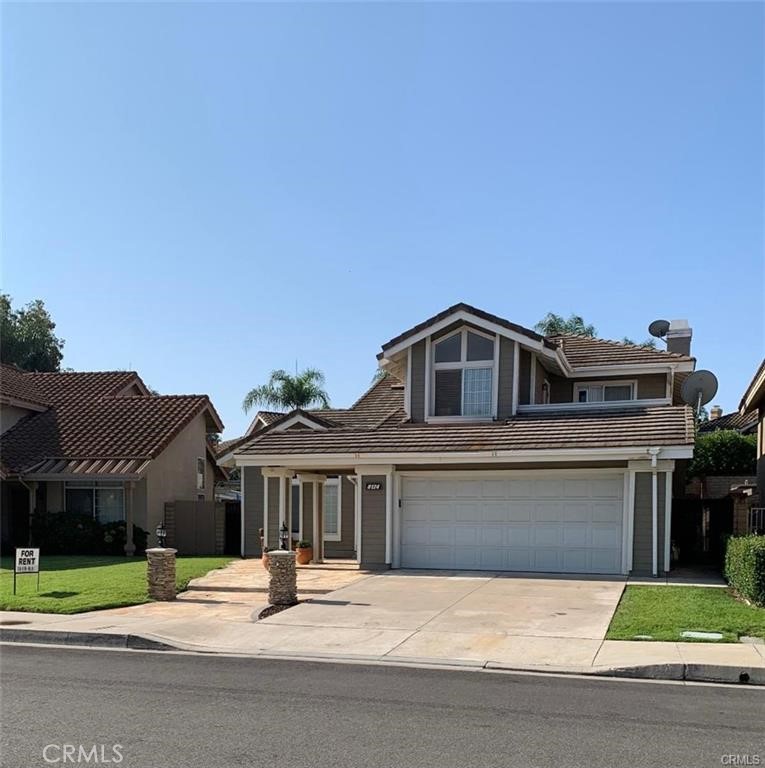 Great two story home with vaulted celling in living room. Formal dining room. Open kitchen with daily dining area. 1 bedroom and One bath downstairs. Master suite with walk-in closet. Master bathroom has dual wash basins and separate tub and shower. Two of the bedrooms up stairs share balcony. Back yard with cover patio and fruit tree, Walking distance to school and park.