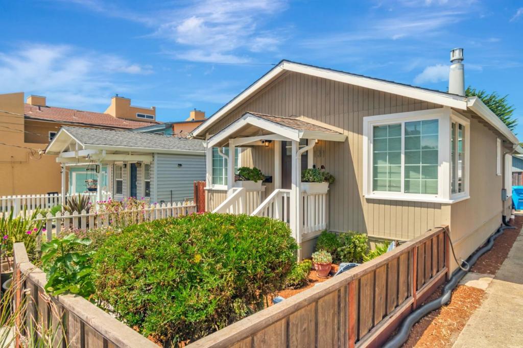 Fully renovated beach bungalow just blocks from the beach and Pacifica Pier! This turn key home offers one bedroom, one bath, a light filled living room with vaulted open beam ceilings and an elegant fireplace. This home has been beautifully renovated with sleek finishes and has maximized every corner and closet for adequate storage. The bright kitchen features stone countertops, cabinets with custom pullout organizers, a skylight and stainless steel appliances, including a gas range. Just off the kitchen is a dining room that's a great place for casual or fomal dining. A stall shower and chic vanity adorn the bathoom that's just steps off the bedroom. A sunroom is the perfect space for a home office, workout room or a secoary living space, that has access to the indoor laundry/utiltiy room that provides additional storage. Just off the sunroom is the low mantenance yard that is all level and features artificial turf for easy maintenance and plenty of room to garden. This home is turn key and is located within walking distance to many shops and reaturants and very close to the beach.