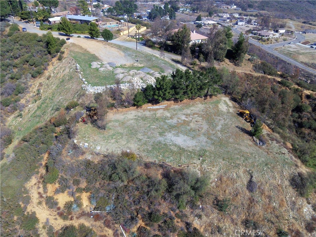 This beautiful 2.86 acre parcel is located at the end of Knoll St. It has views forever from this unique knoll. You will feel isolated from the day to day grind. It offers seclusion, views, privacy and is on a great street located in Devore. Devore is small, unincorporated area in the County of San Bernardino with a fire station, elementary school and MOM'S STORE. Please take a look at this spectacular lot.