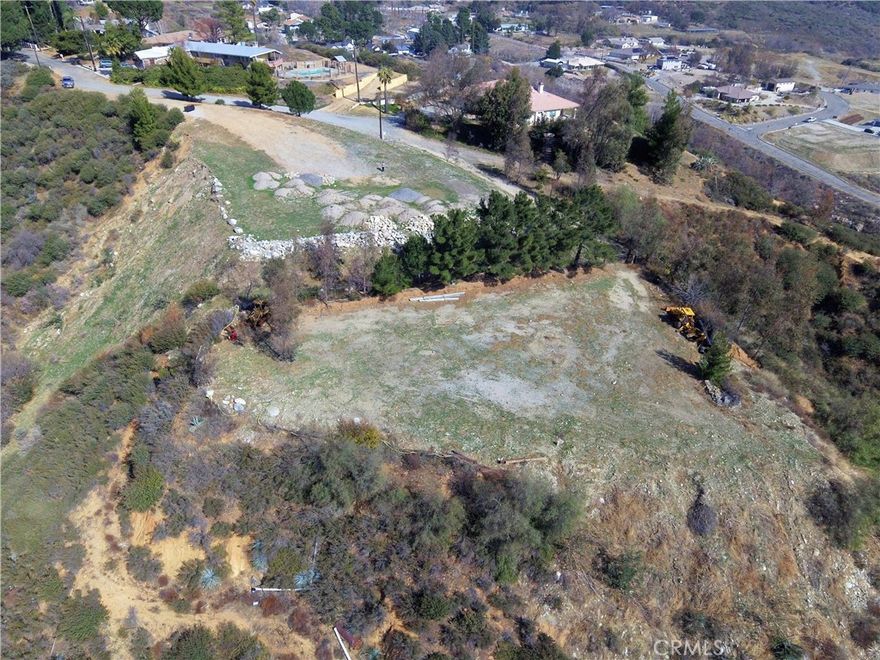 This beautiful 2.86 acre parcel is located at the end of Knoll St. It has views forever from this unique knoll. You will feel isolated from the day to day grind. It offers seclusion, views, privacy and is on a great street located in Devore. Devore is small, unincorporated area in the County of San Bernardino with a fire station, elementary school and MOM'S STORE. Please take a look at this spectacular lot.