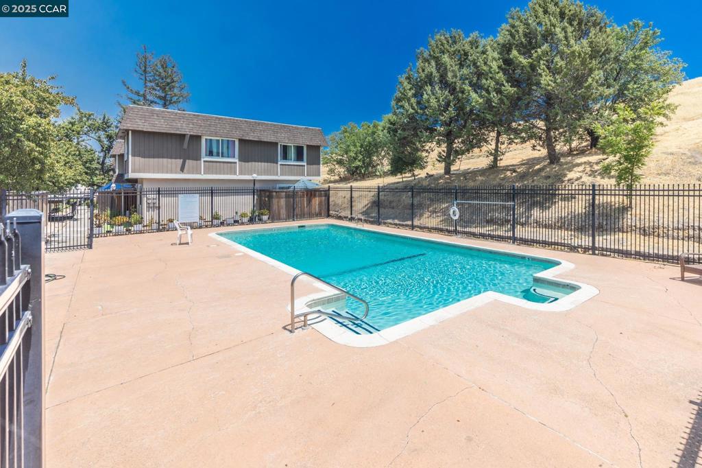 Lovely 2-bedroom, 1.5-bath condo in a well-maintained Vacaville community. Enjoy cooking in style with sleek stone countertops, modern cabinetry, and upscale flooring that complements the warm, cheerful ambiance. Generous-sized bedrooms, well-appointed bathrooms, and convenient in-unit laundry add comfort and functionality. The low-maintenance patio is perfect for relaxing or entertaining. Enjoy the sparkling community pool and beautifully kept grounds. Prime location with easy access to transportation, highways, shopping, and dining.