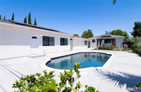 Photo of 11831 Pomering RD #A, Downey, CA 90241 (MLS # DW26154914)
