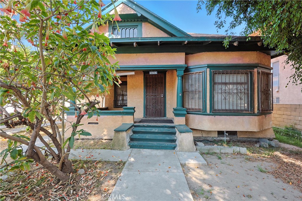 Location in the vibrant and fast-growing neighborhood of Highland Park, this rare property features two single-family homes and a duplex all on a spacious 18,000+ sq ft lot-perfect for multi-generational living, rental income or future development potential. The front two-story offers 1872 sq with 4 bedrooms, 1.25 bath, generous living space, ideal for a large family. The second single-family home is 1376 sf ft, featuring 2 bedrooms and 1.25 bath providing a comfortable living arrangement. At the fear of the lot sits a charming duplex each unit 604 sq ft offing 1 bedroom 1 bath and in-unit laundry an excellent setup tenants or guests. This property is nestled in Highland Park one of LA's most desirable neighborhoods just minutes from trendy
York Blvd., local dining shopping, and public transportation. Don't miss this unique chance to own a versatile property with great income potential and endless possibilities. Live in one, rent the rest of build out your dream compound in one of LA' most dynamic communities.
Bonus: The property includes a permitted 25'x 40'Garage (approx. 1,000 sq ft) with excellent potential for conversion into a spacious ADU, offering even more flexibility and long-term value.