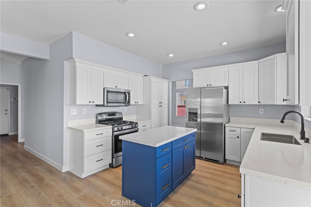 Just remodeled! This home truly has it all, the beautifully designed 4 bed, 3 bath home nearly 2,100 SqFt of stylish living space. If you haven't lived in a Cul-de-sac before, this is your chance, for a safer street for children and adults, reduced noise with less cars and people driving slower, and great neighbors! Recent upgrades include a brand-new kitchen with white shaker cabinets and slow close drawers, high end Calacatta quartz countertops, and new high end stainless steel appliances. New Luxury vinyl plank flooring throughout. All bathrooms feature new vanities, and the home is refreshed with new fans, light fixtures, and hardware throughout. Large master suite with big walk-in closet and his an hers sinks. New paint interior and exterior.
Enjoy the open layout with a downstairs bedroom and full bathroom—ideal for guests or multigenerational living. The spacious backyard includes a newer aluminum patio cover perfect for BBQ's and events or just hanging out with the family, above-ground hot tub, and plenty of room for a pool or ADU. The 3-car garage offers ADU potential as well, build out 1 or 1.5 of the garage spaces and rent it out to help with the mortgage! Or a classic man-cave or work out gym! Perfect west facing roof for the most producing solar panels, if you decide to do add solar one day.
Located walking distance to the highly rated Temescal Valley Elementary School, with easy access to express lanes for quick commutes to Orange County. FHA-friendly and move-in ready—this home offers value, style, and flexibility all in one! Low taxes and NO Mello-Roos!