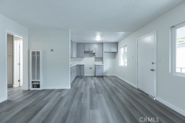 Boasting a newly renovated bathroom, and new vinyl flooring and painting throughout, you will love this beautiful 2 bed 1 bath unit. This second story unit is in a friendly gated community. With access to community laundry, and water and trash included with rent, this home offers great value!