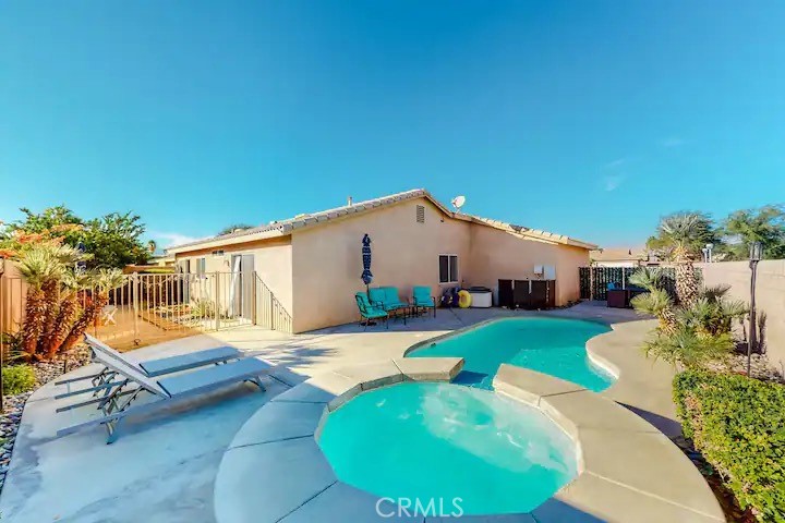 Located in a quiet cul-de-sac less than 2 miles from the heart of town, this desert oasis is a sure bet for your extended retreat. Completely furnished and detailed with all you need for a fabulous stay, this sunlit home presents a pristine interior with a full kitchen with stainless steel appliances and an intimate living area for movie nights. The kitchen even is equipped with a toaster oven/air fryer, rice cooker, waffle maker, blender, and electric wine bottle opener.
The outdoor haven of this dog-friendly rental features a fenced yard with a private saltwater pool, spa, a gas grill, and more than one sitting area. The main suite offers a smart TV and access to the pool deck, another one of the bedrooms has a desk and a smart TV, and the third bedroom is fitted with a gaming console with 4,000 video games to choose from! Each bedroom has a memory foam mattress with both firm and soft pillows, as well as charging stations. Family-friendly perks include a high chair, books, and board games.
Offered at $3000/month without utilities included. Available to move in starting on Nov 1st. First showing at the open house on October 4th 1 - 4 PM.