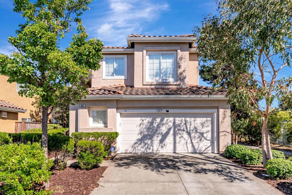 Located in a wonderful cul-de-sac, this property offers a prime spot directly across from a lagoon and greenbelt, providing serene views and easy access to outdoor spaces and nice strolls. This spacious 2,028 sq ft home is filled with lots of windows that provides natural light and features high ceilings in the living room, creating a bright and airy atmosphere. The open-concept kitchen and family room, complete with a cozy fireplace, make it an ideal space for both everyday living and entertaining. The residence boasts four comfortable bedrooms and two and a half bathrooms, offering a versatile floor plan. The master bedroom is particularly appealing with its vaulted ceilings and a large walk-in closet. The bathroom features double sink and tub. You'll also appreciate the charming lagoon views from the two front bedrooms. Additional practical features include a spacious driveway ensuring ample parking and storage, a two-car garage, and convenient indoor laundry. The backyard provides a lovely, cozy area for gardening or entertaining and perfect for relaxing. The home is also conveniently located near the SF Ferry, Shoreline, the lagoon path, Harbor Bay Landing shopping, and Oakland International Airport.